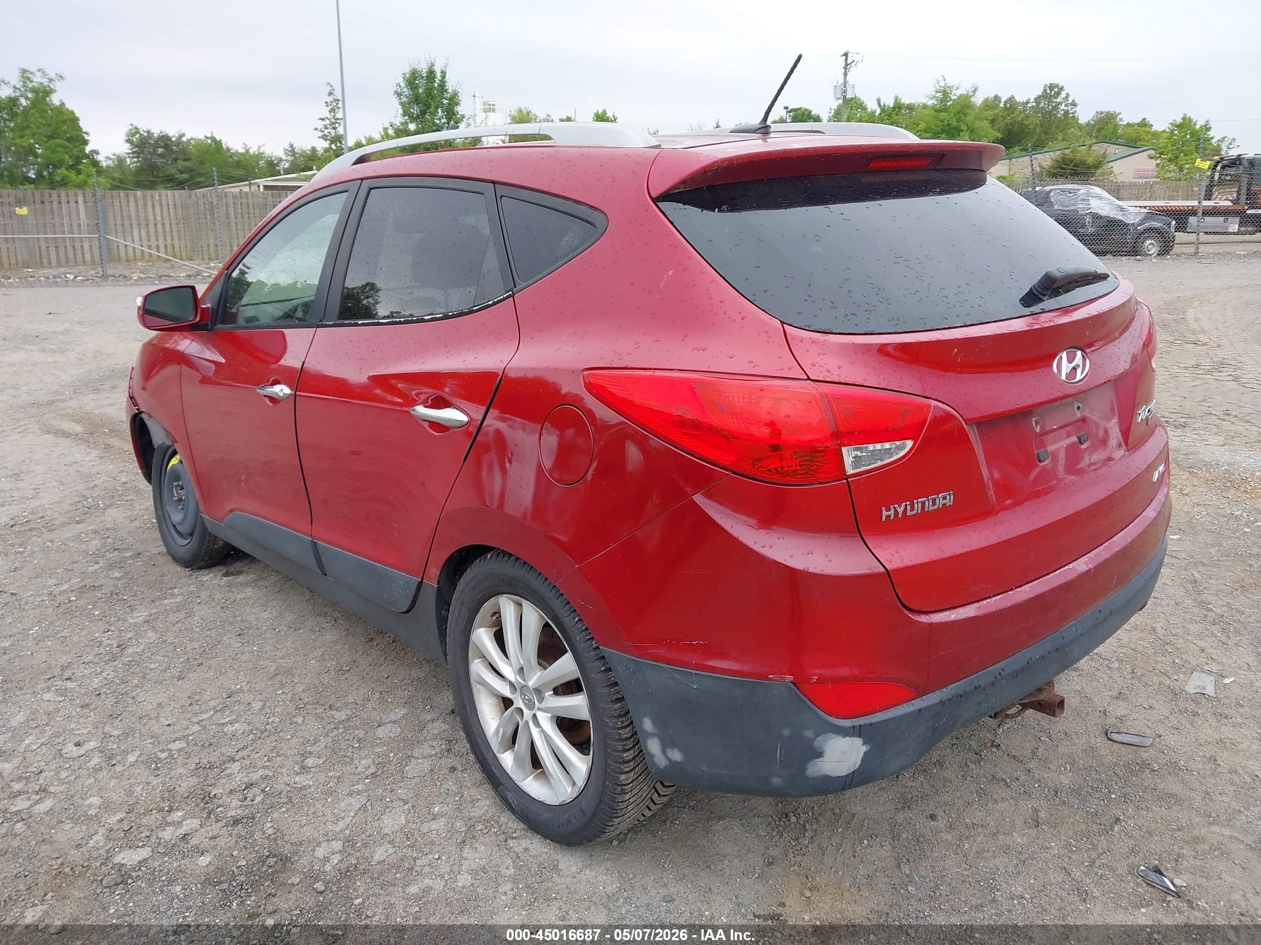 2011 Hyundai Tucson Limited Burgundy vin: KM8JUCACXBU311025