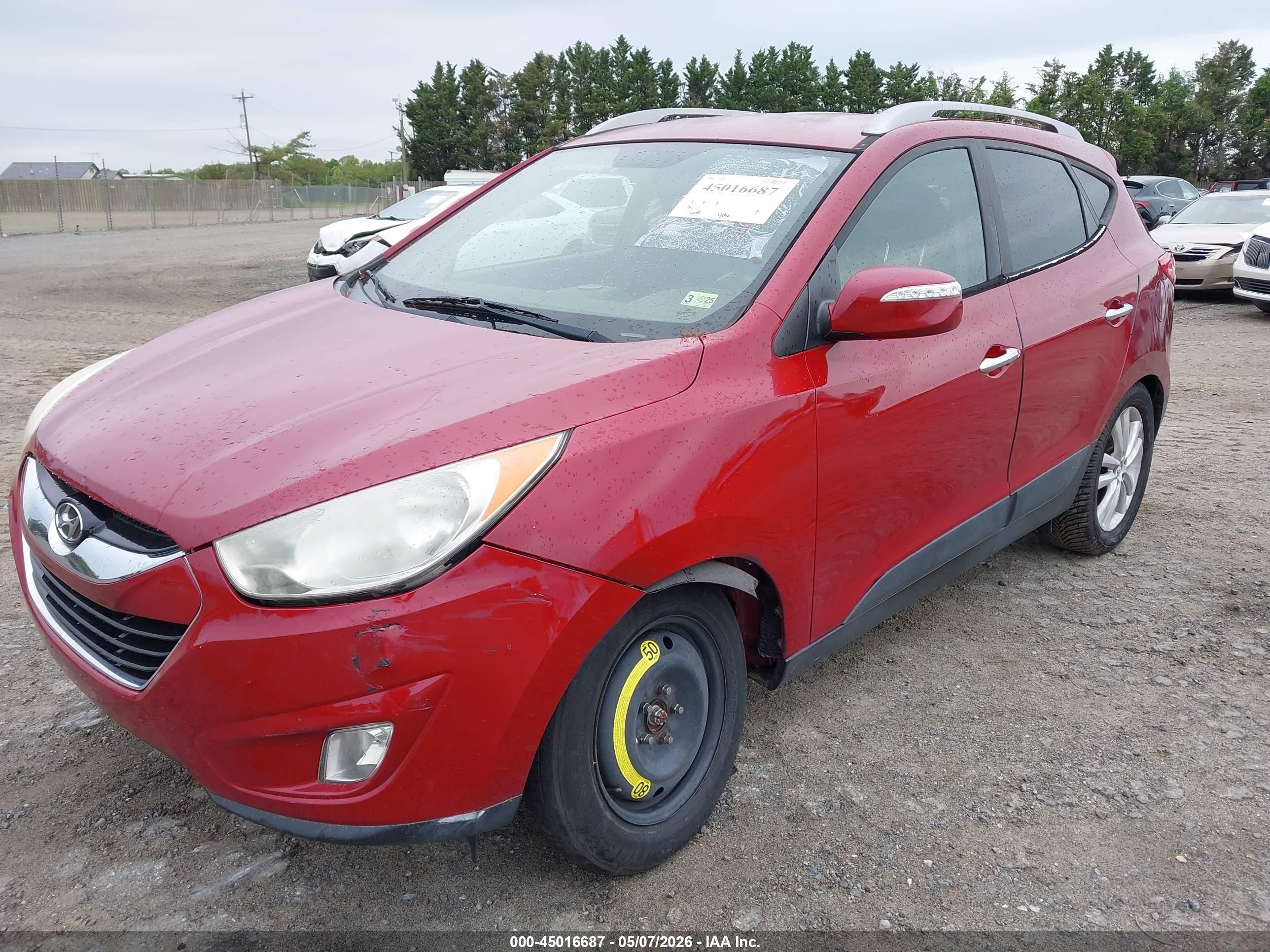 2011 Hyundai Tucson Limited Burgundy vin: KM8JUCACXBU311025