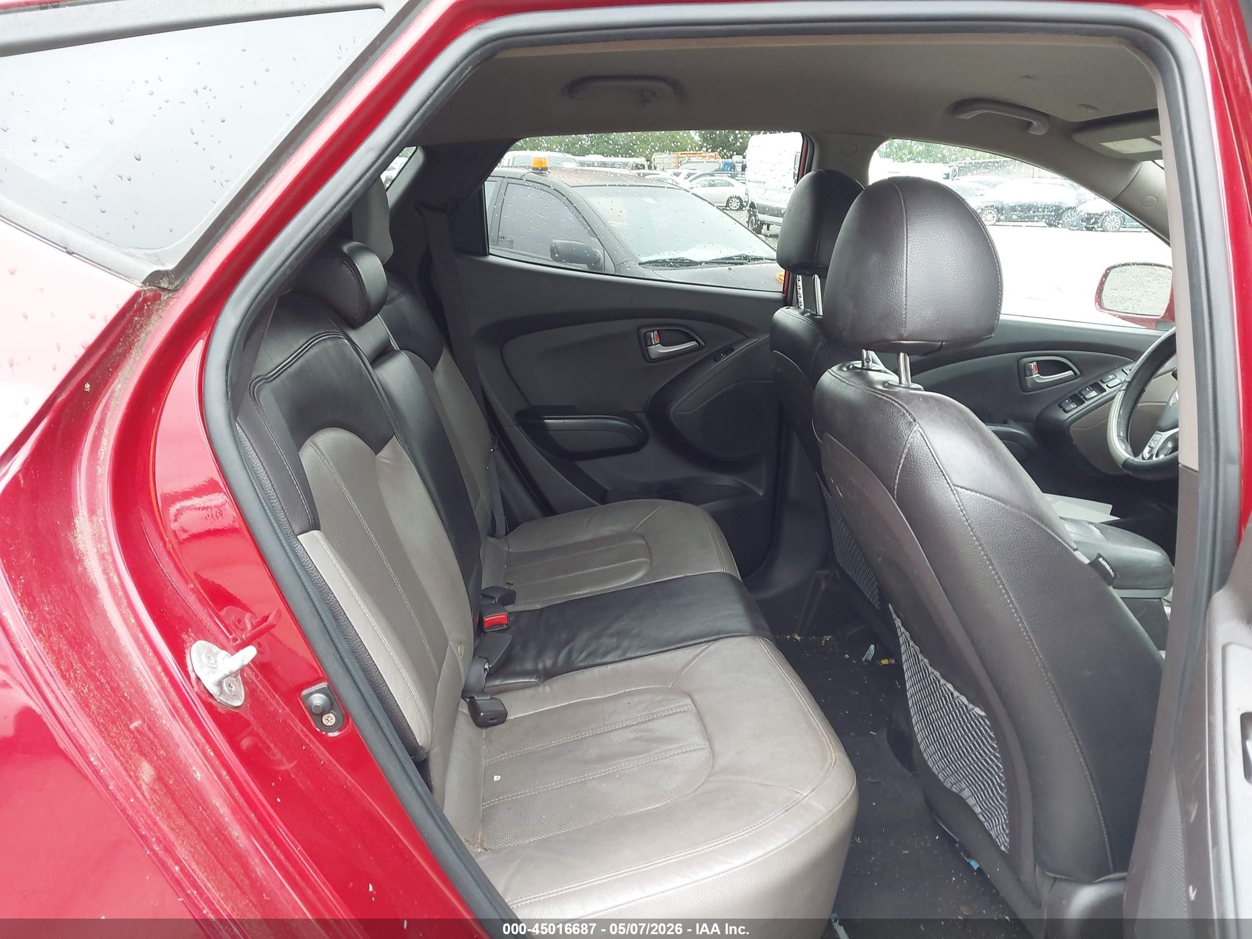 2011 Hyundai Tucson Limited Burgundy vin: KM8JUCACXBU311025