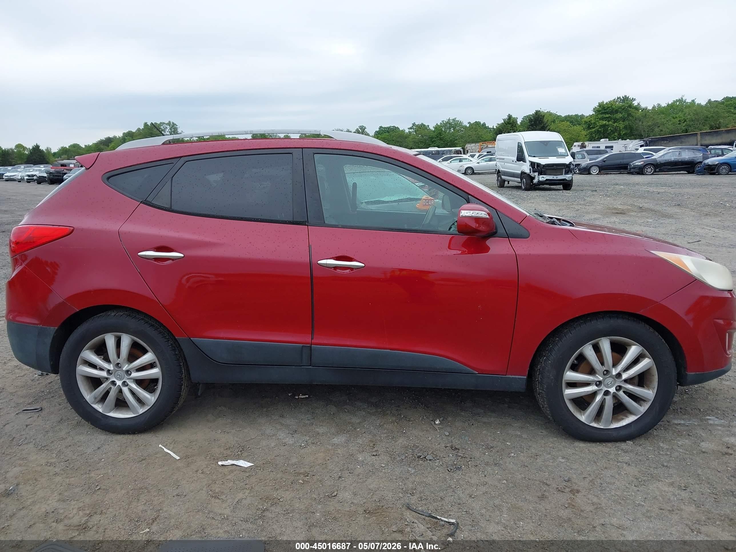 2011 Hyundai Tucson Limited Burgundy vin: KM8JUCACXBU311025