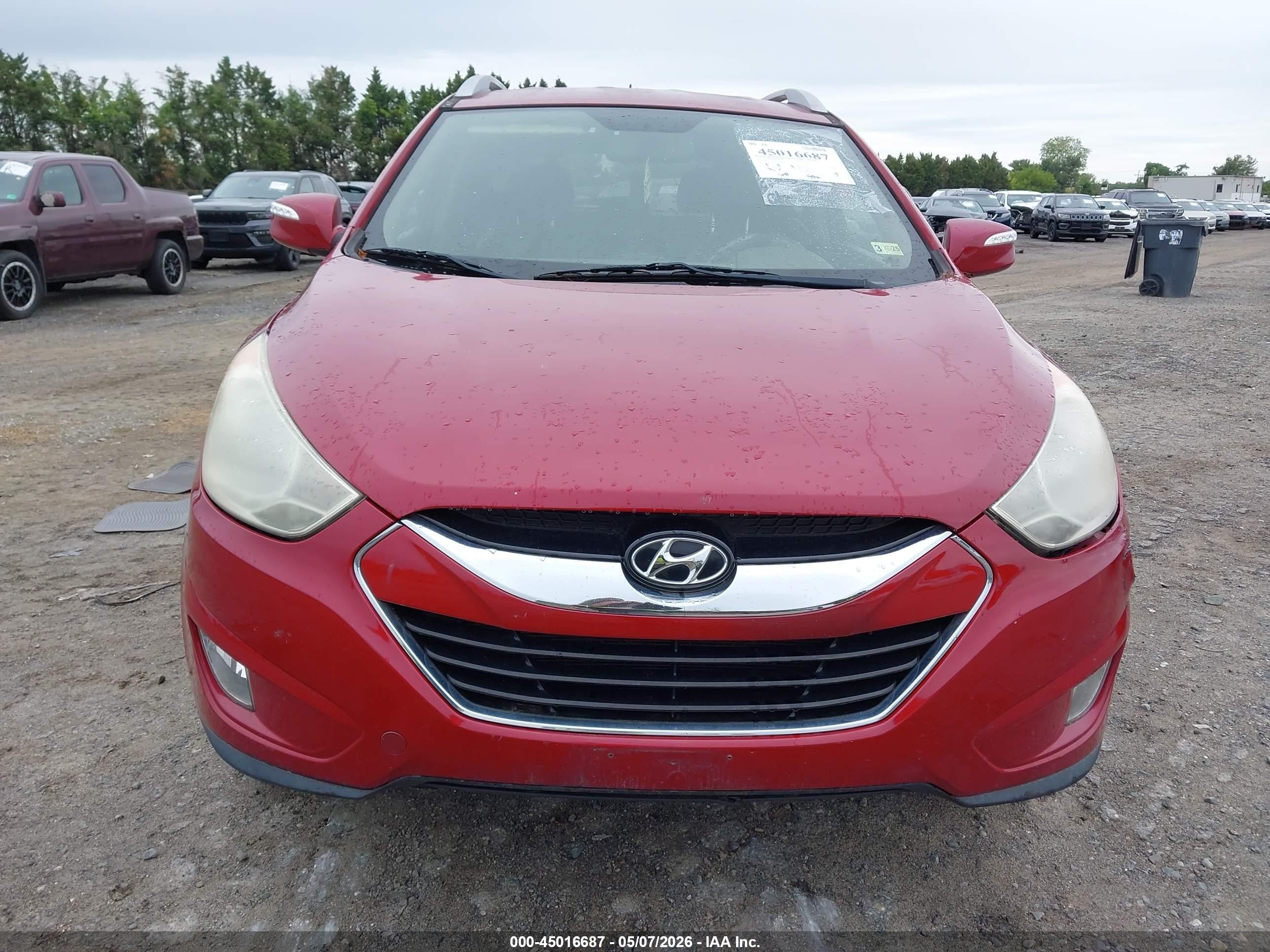 2011 Hyundai Tucson Limited Burgundy vin: KM8JUCACXBU311025