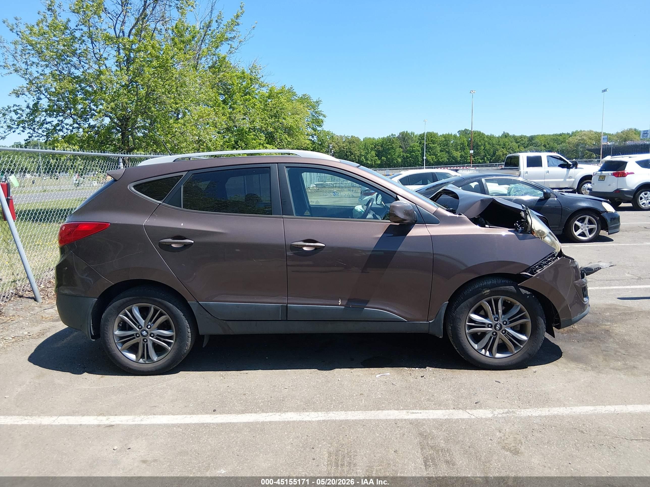 2014 Hyundai Tucson Se Коричневый vin: KM8JUCAG1EU844890