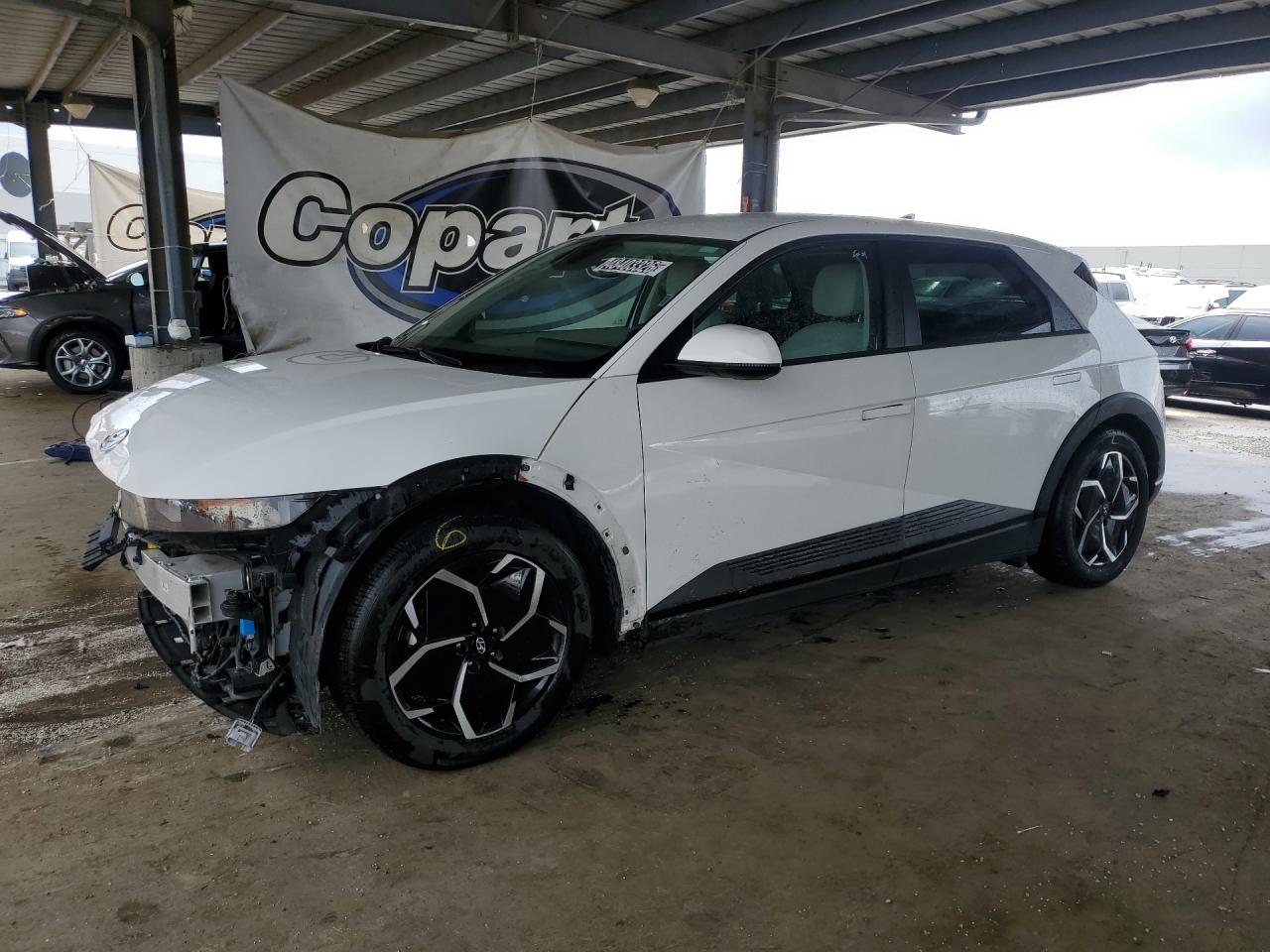 2023 Hyundai Ioniq 5 Sel White vin: KM8KNDAF0PU216787 Damage: Left Front Door, Dent(S) W/ Paint Dmg, 9 To 10 Inches