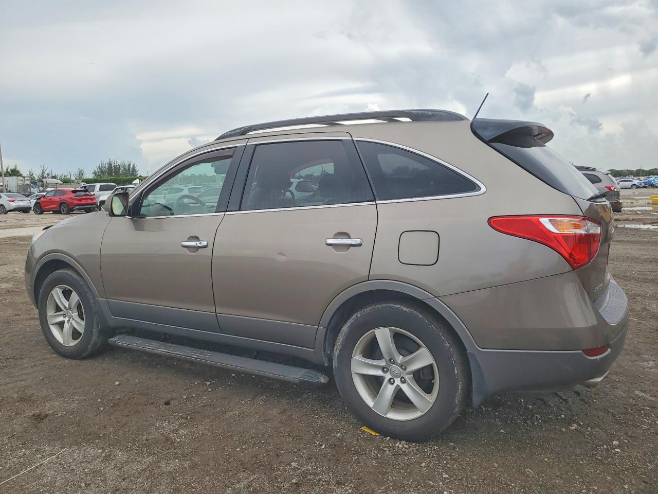 2010 Hyundai Veracruz Limited Золотой vin: KM8NU4CC4AU122177