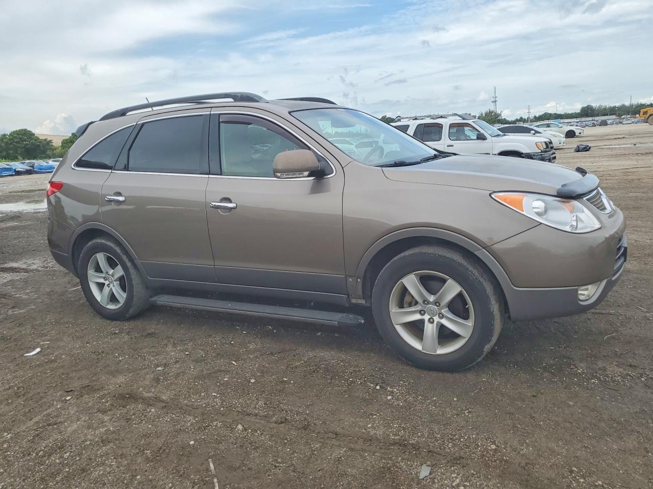 2010 Hyundai Veracruz Limited Золотой vin: KM8NU4CC4AU122177