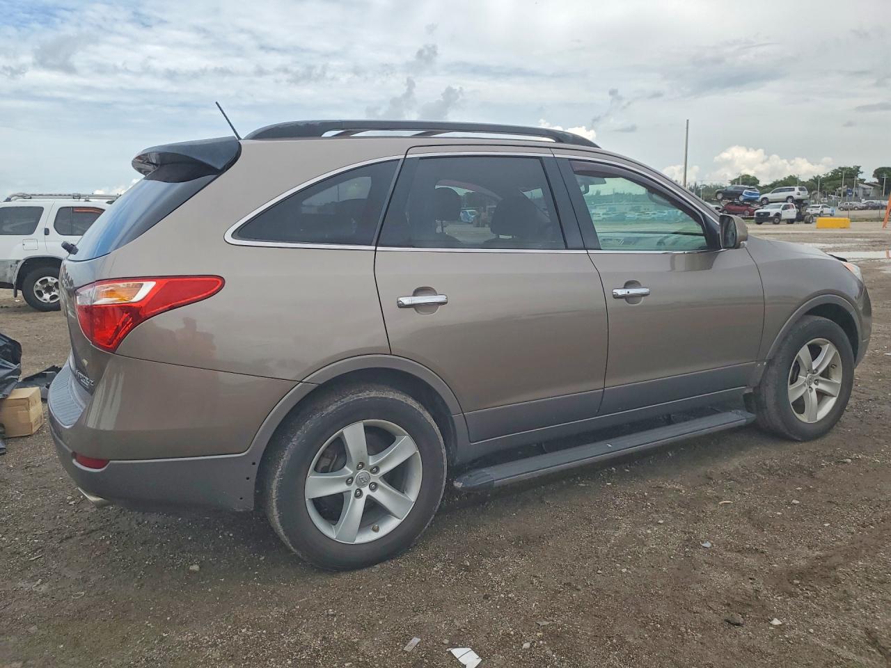 2010 Hyundai Veracruz Limited Золотой vin: KM8NU4CC4AU122177
