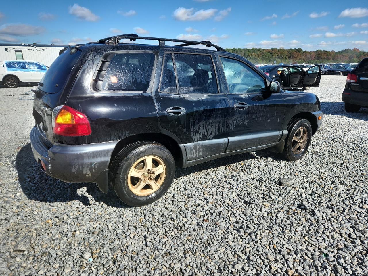 2001 Hyundai Santa Fe Black vin: KM8SB82B41U106019
