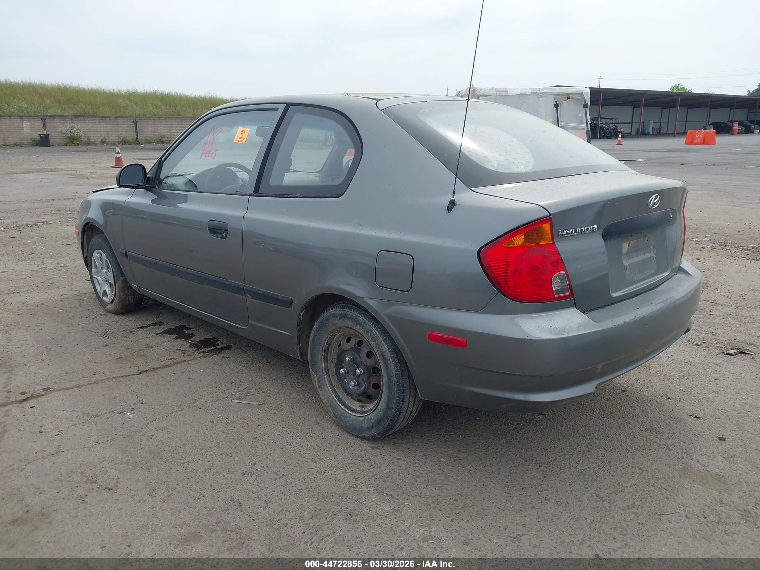 2004 Hyundai Accent   Gray vin: KMHCF35C04U305802