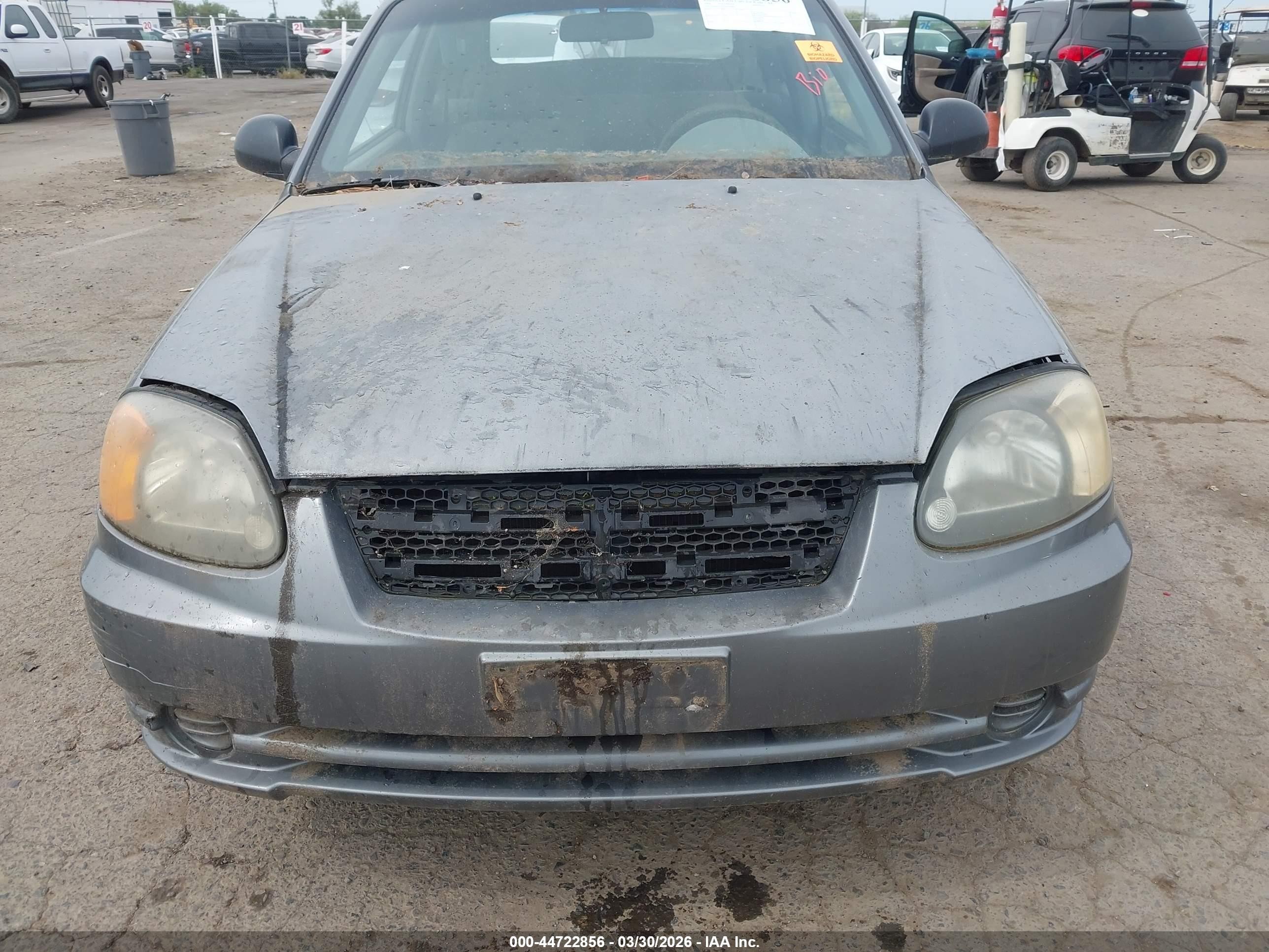 2004 Hyundai Accent   Gray vin: KMHCF35C04U305802