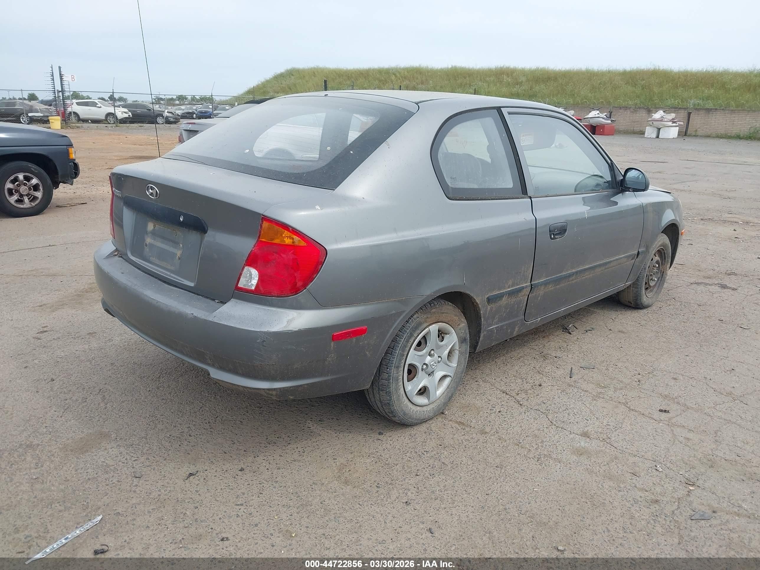 2004 Hyundai Accent   Gray vin: KMHCF35C04U305802