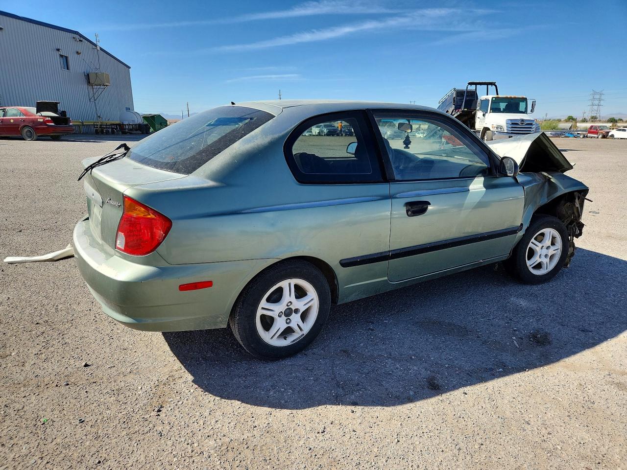 2004 Hyundai Accent L Teal vin: KMHCF35C24U314145