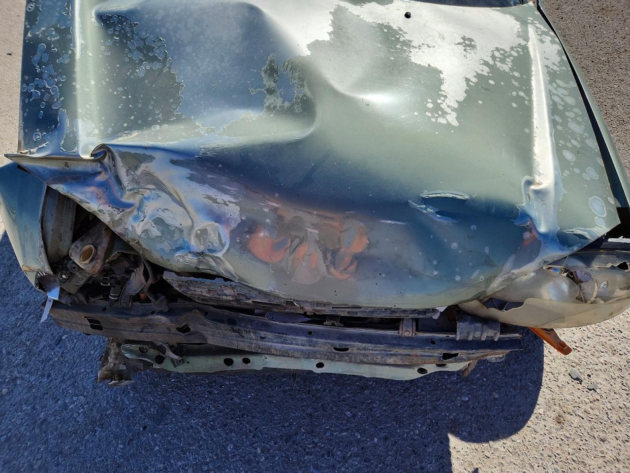 2004 Hyundai Accent L Teal vin: KMHCF35C24U314145