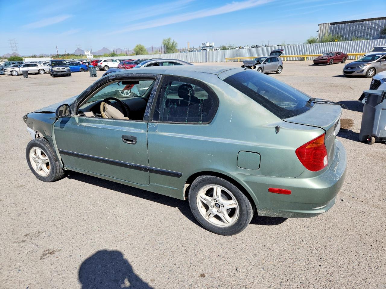 2004 Hyundai Accent L Teal vin: KMHCF35C24U314145