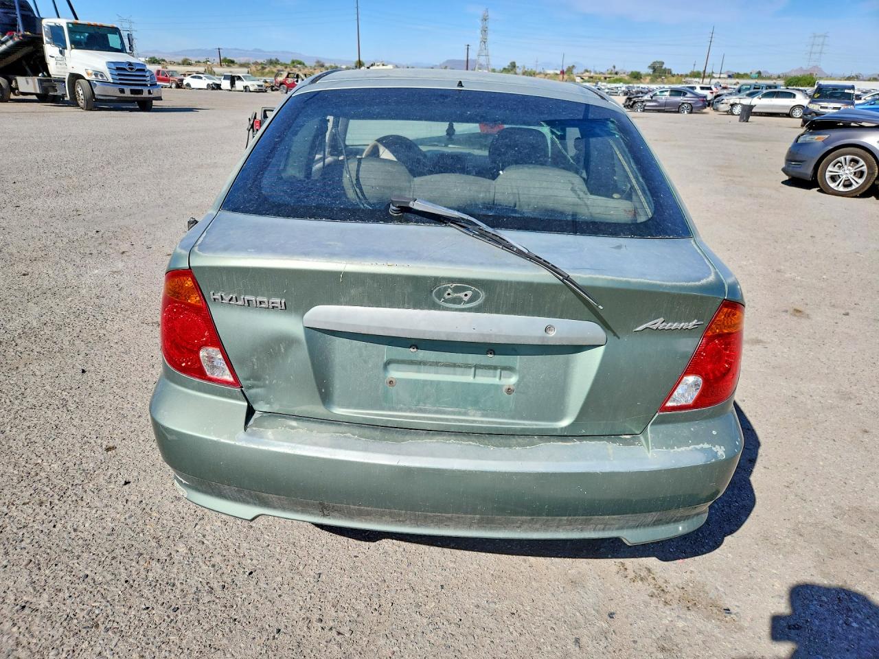 2004 Hyundai Accent L Teal vin: KMHCF35C24U314145