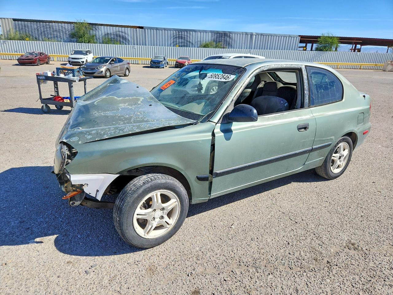 2004 Hyundai Accent L Teal vin: KMHCF35C24U314145