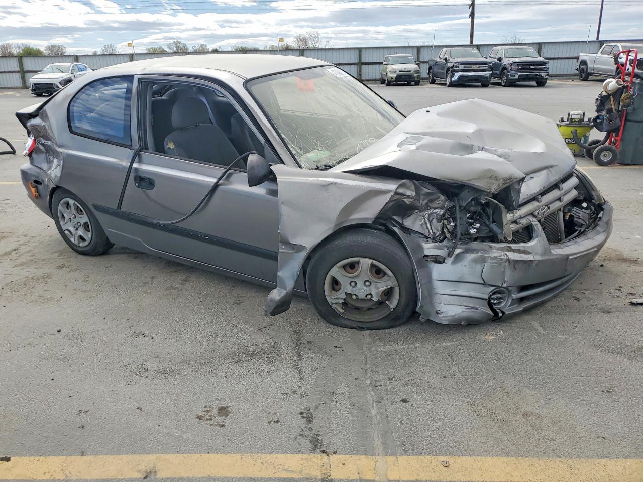 2004 Hyundai Accent Base Gray vin: KMHCF35C54U299849