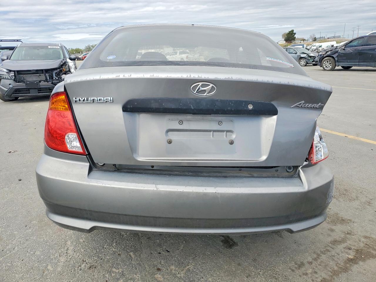 2004 Hyundai Accent Base Gray vin: KMHCF35C54U299849