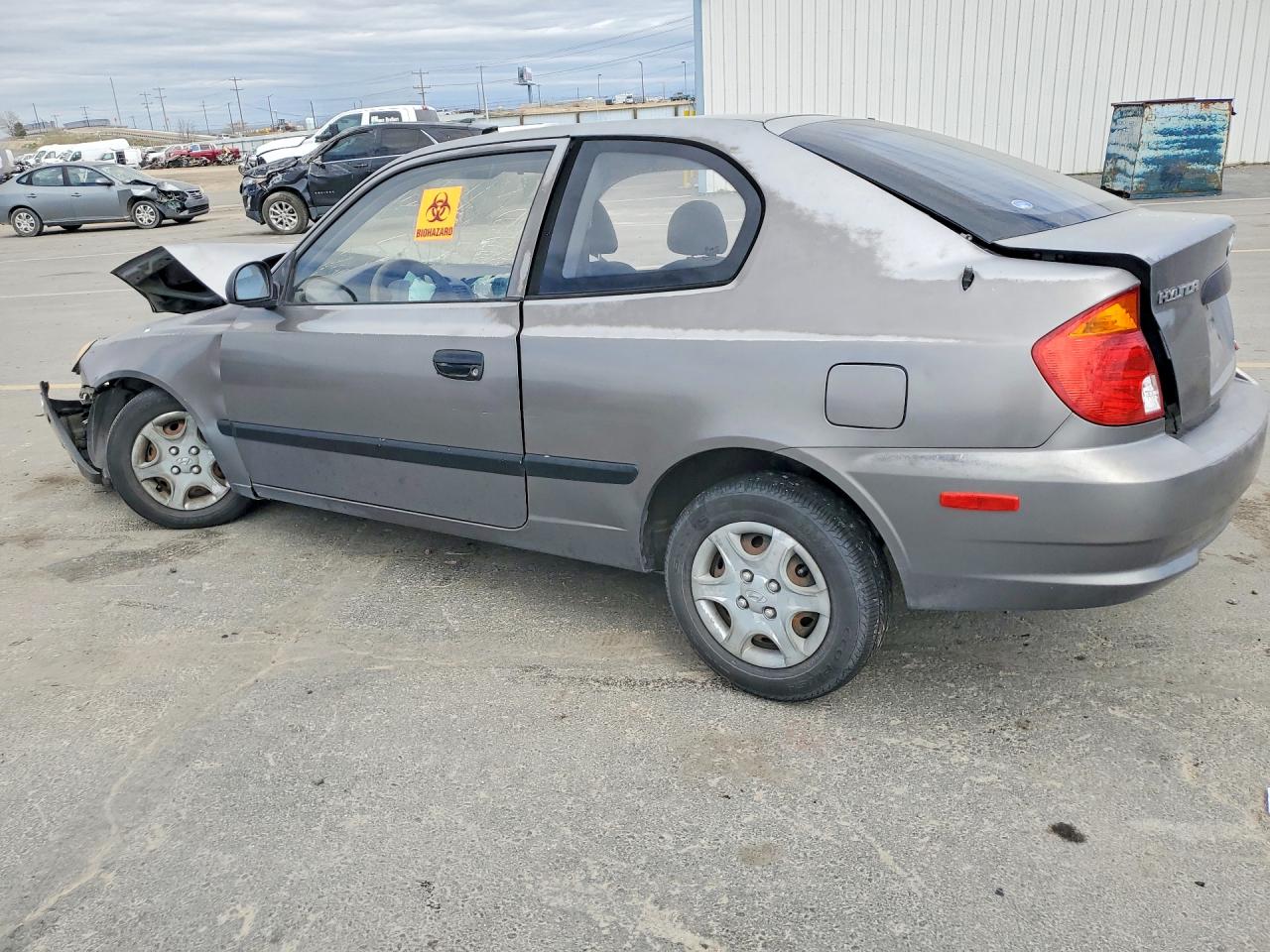 2004 Hyundai Accent Base Gray vin: KMHCF35C54U299849
