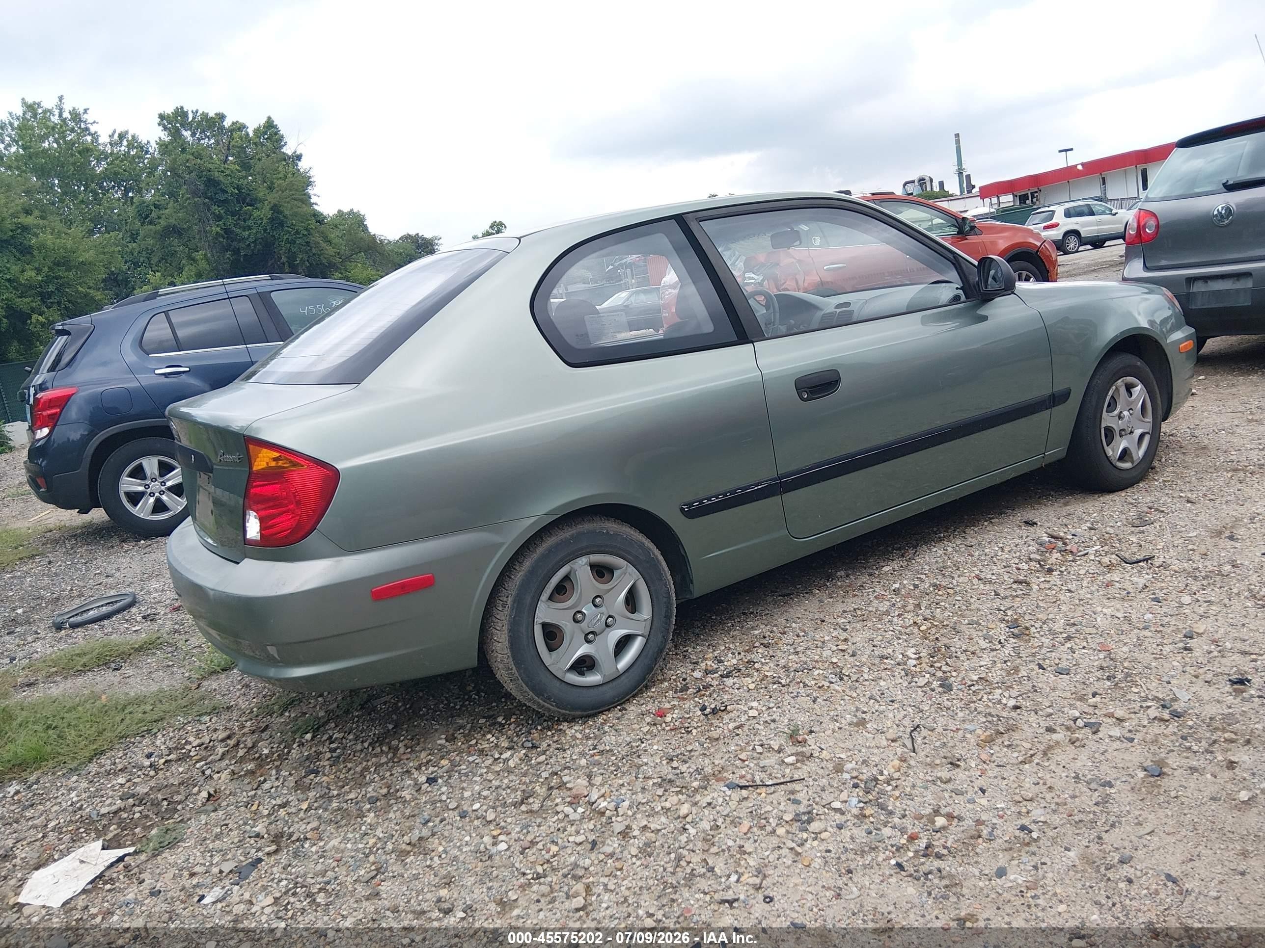 2004 Hyundai Accent   Green vin: KMHCF35C54U299866