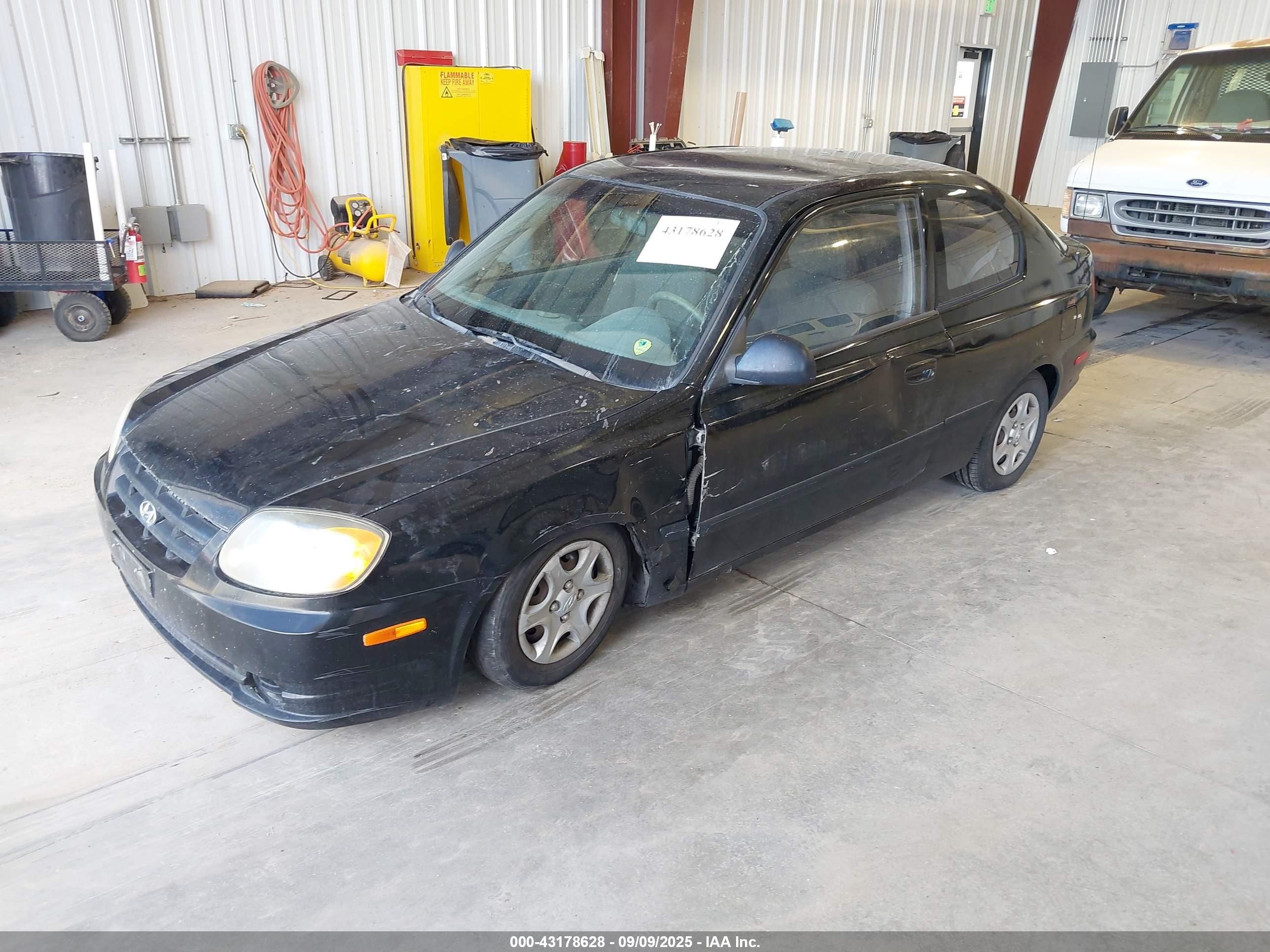 2004 Hyundai Accent   Black vin: KMHCF35C74U310141