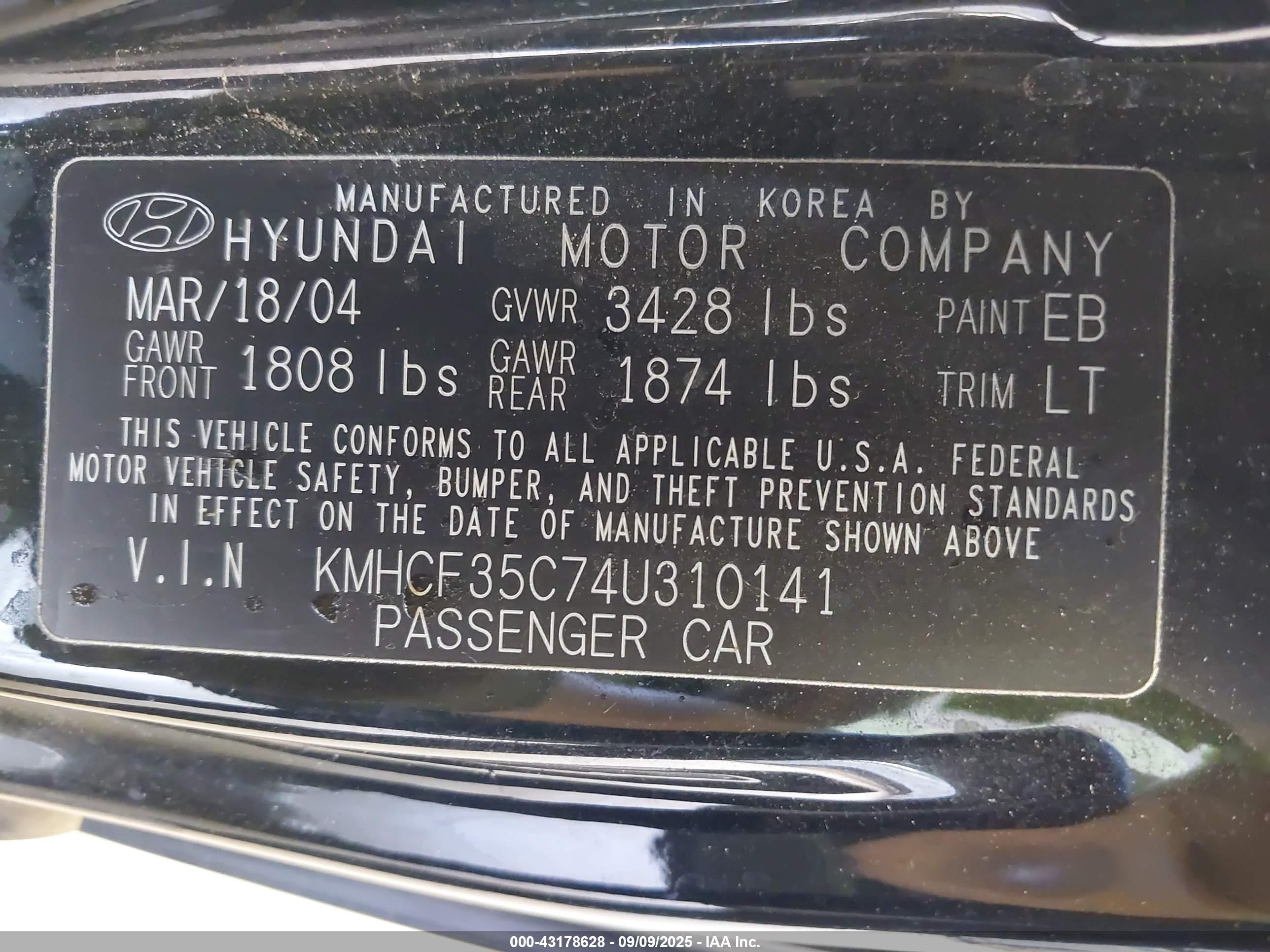 2004 Hyundai Accent   Black vin: KMHCF35C74U310141