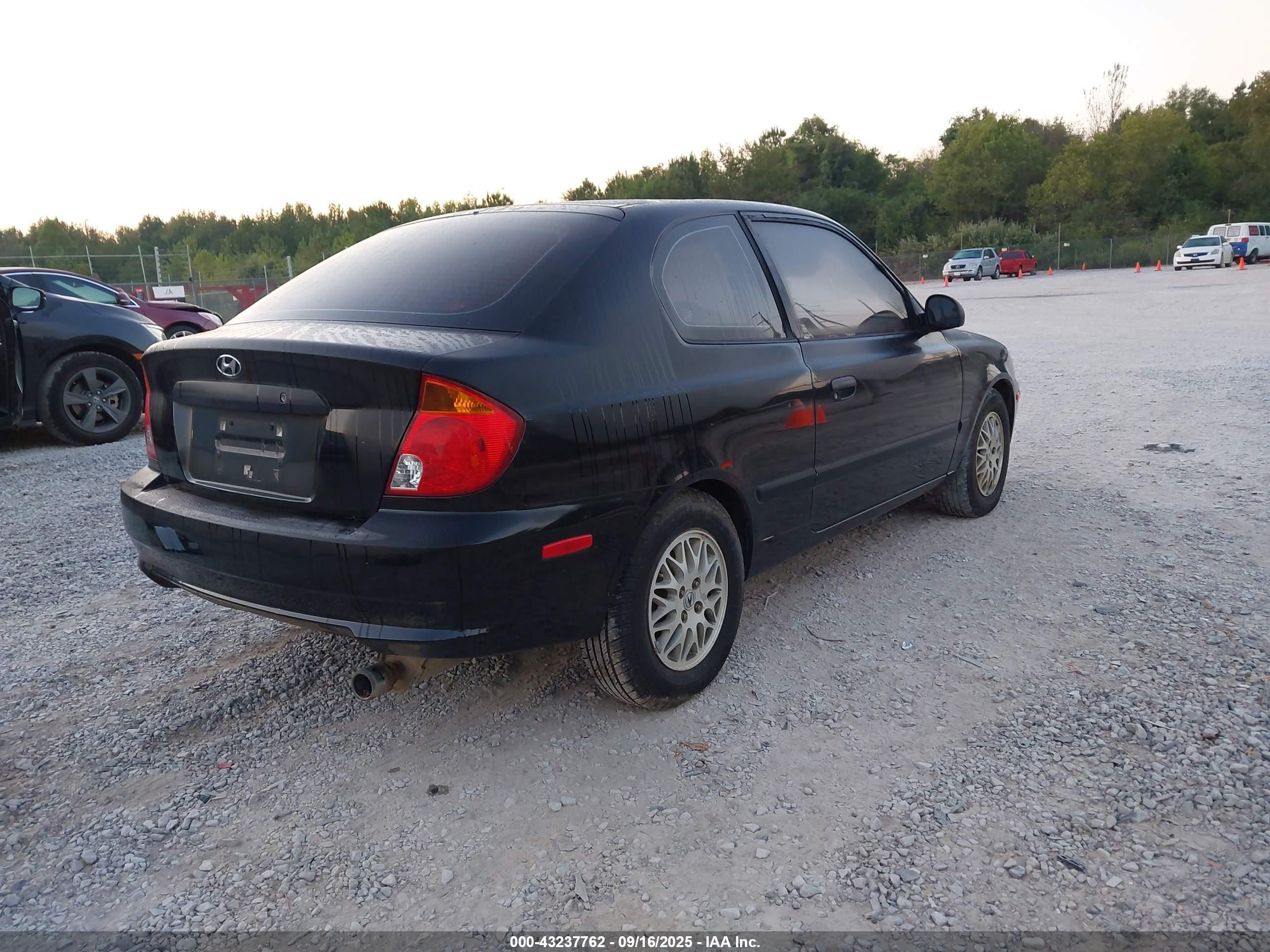 2004 Hyundai Accent   Black vin: KMHCF35C94U289597