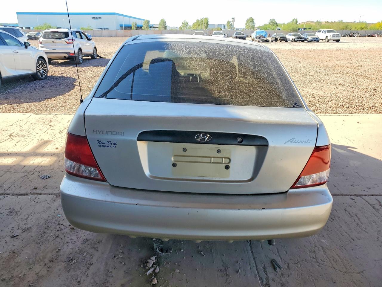 2001 Hyundai Accent L Gold vin: KMHCF35G61U149781
