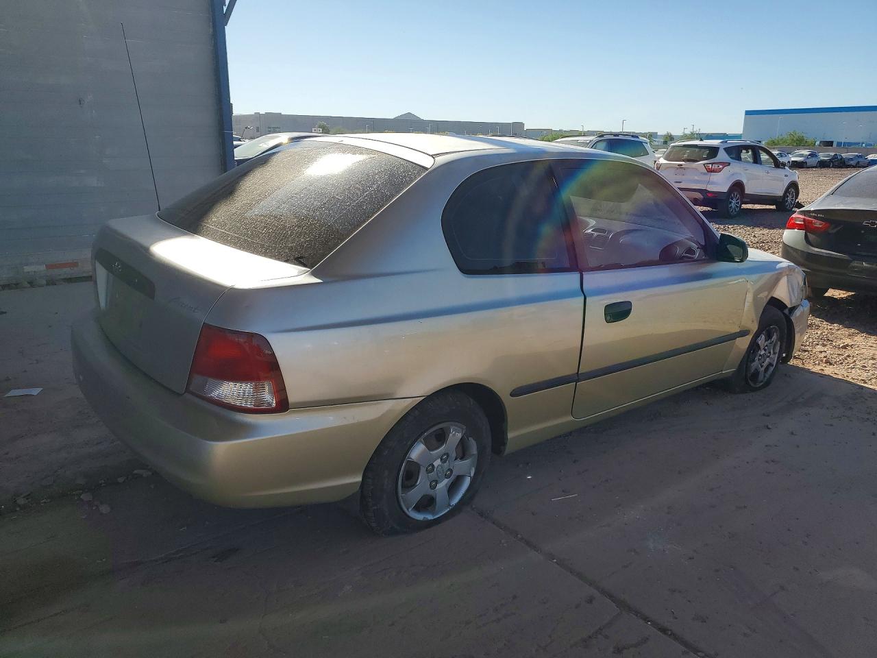 2001 Hyundai Accent L Gold vin: KMHCF35G61U149781