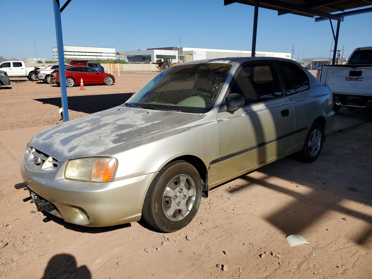 2001 Hyundai Accent L Gold vin: KMHCF35G61U149781