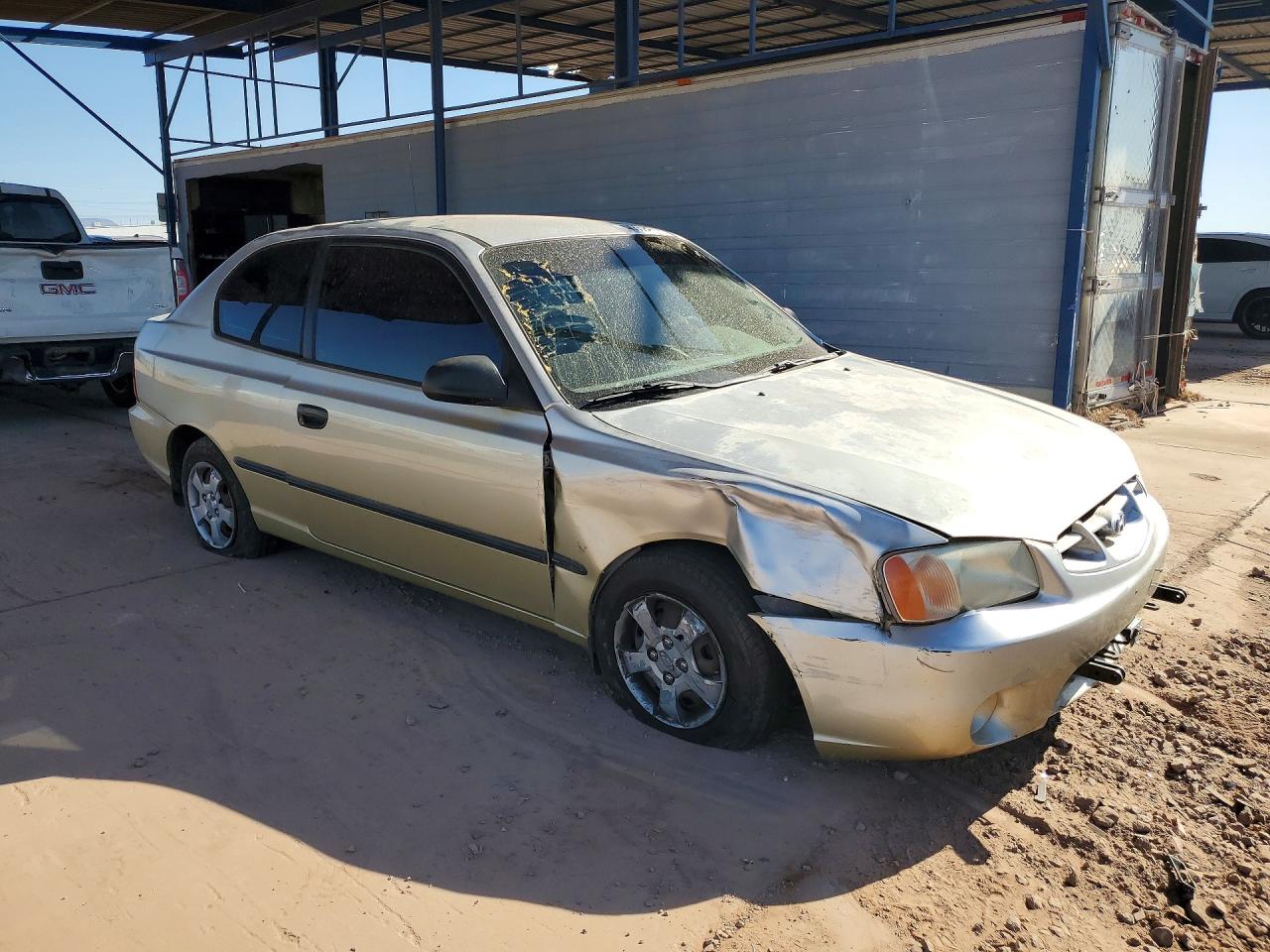 2001 Hyundai Accent L Gold vin: KMHCF35G61U149781