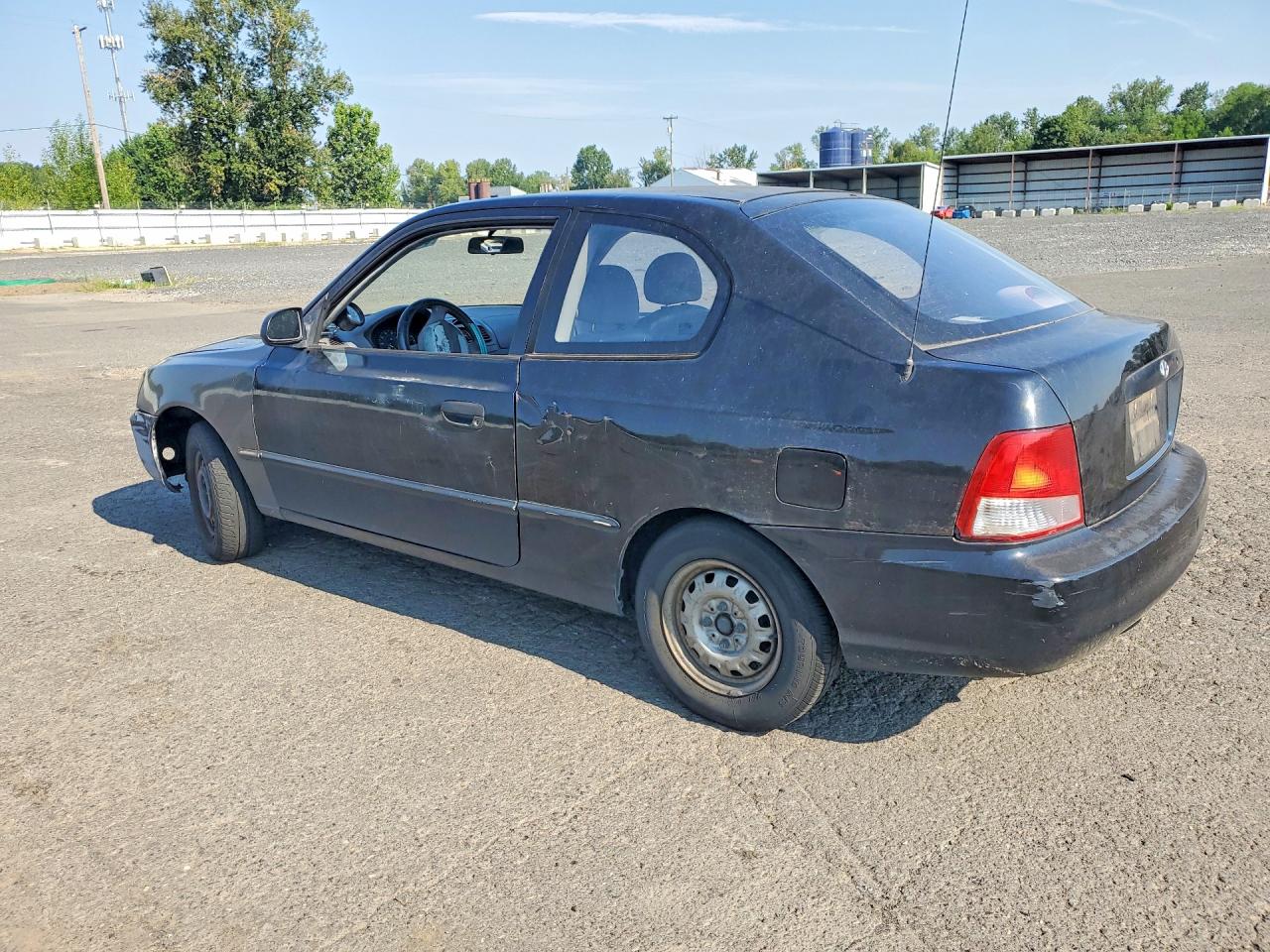 2000 Hyundai Accent L Black vin: KMHCF35G7YU039171