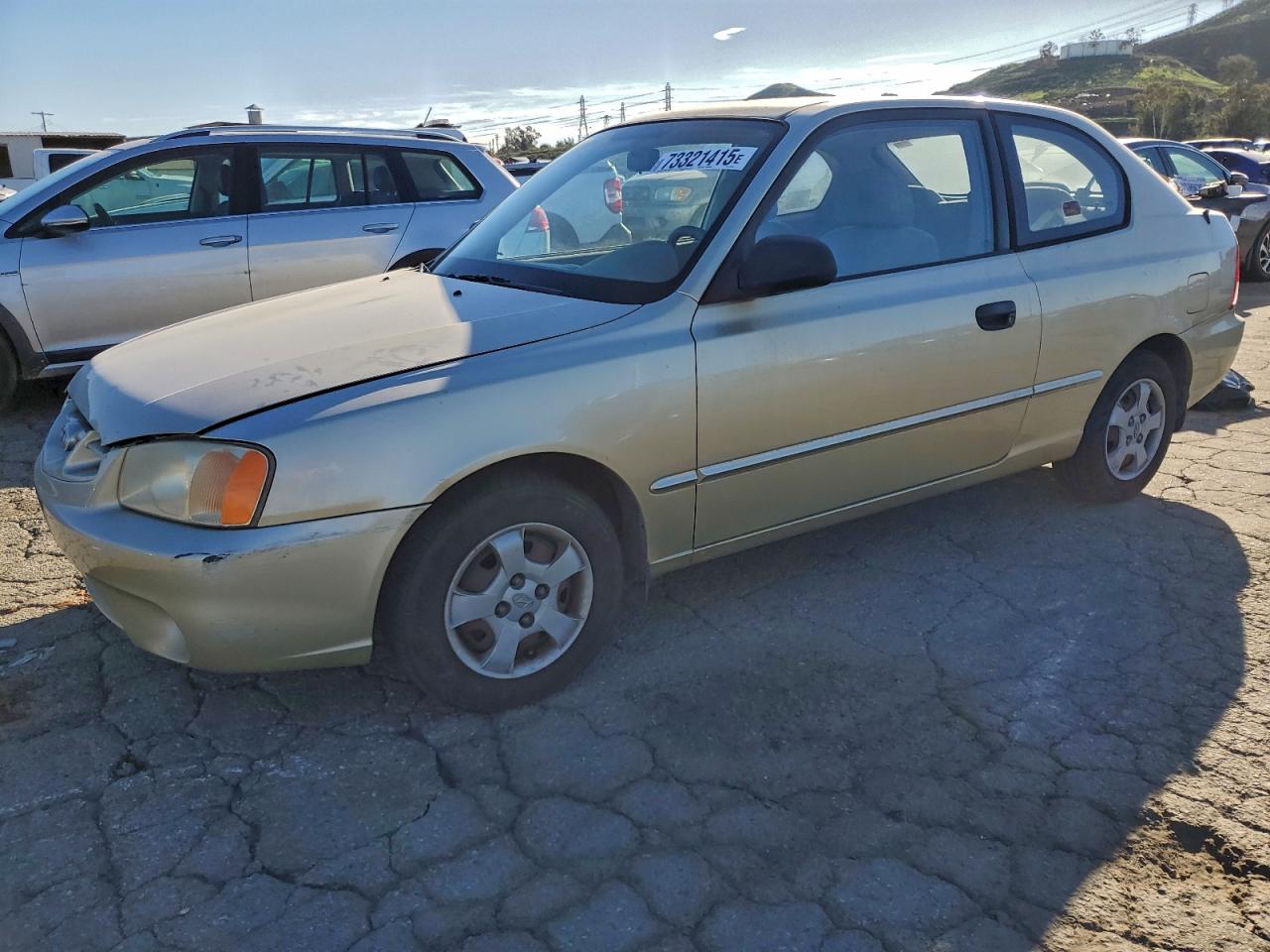 2001 Hyundai Accent Gs Gold vin: KMHCG35CX1U077011