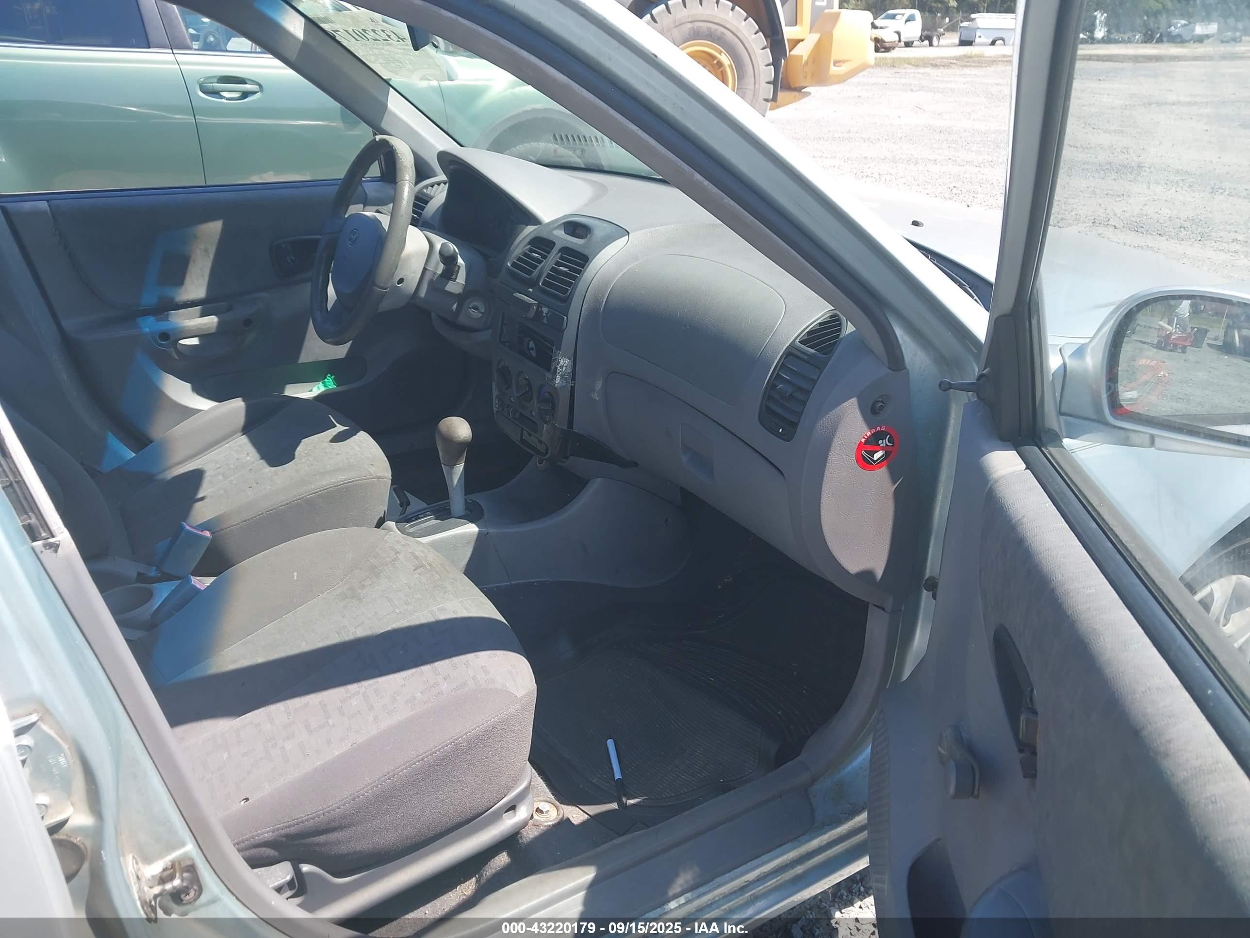 2004 Hyundai Accent Gl Light Blue vin: KMHCG45C34U499258