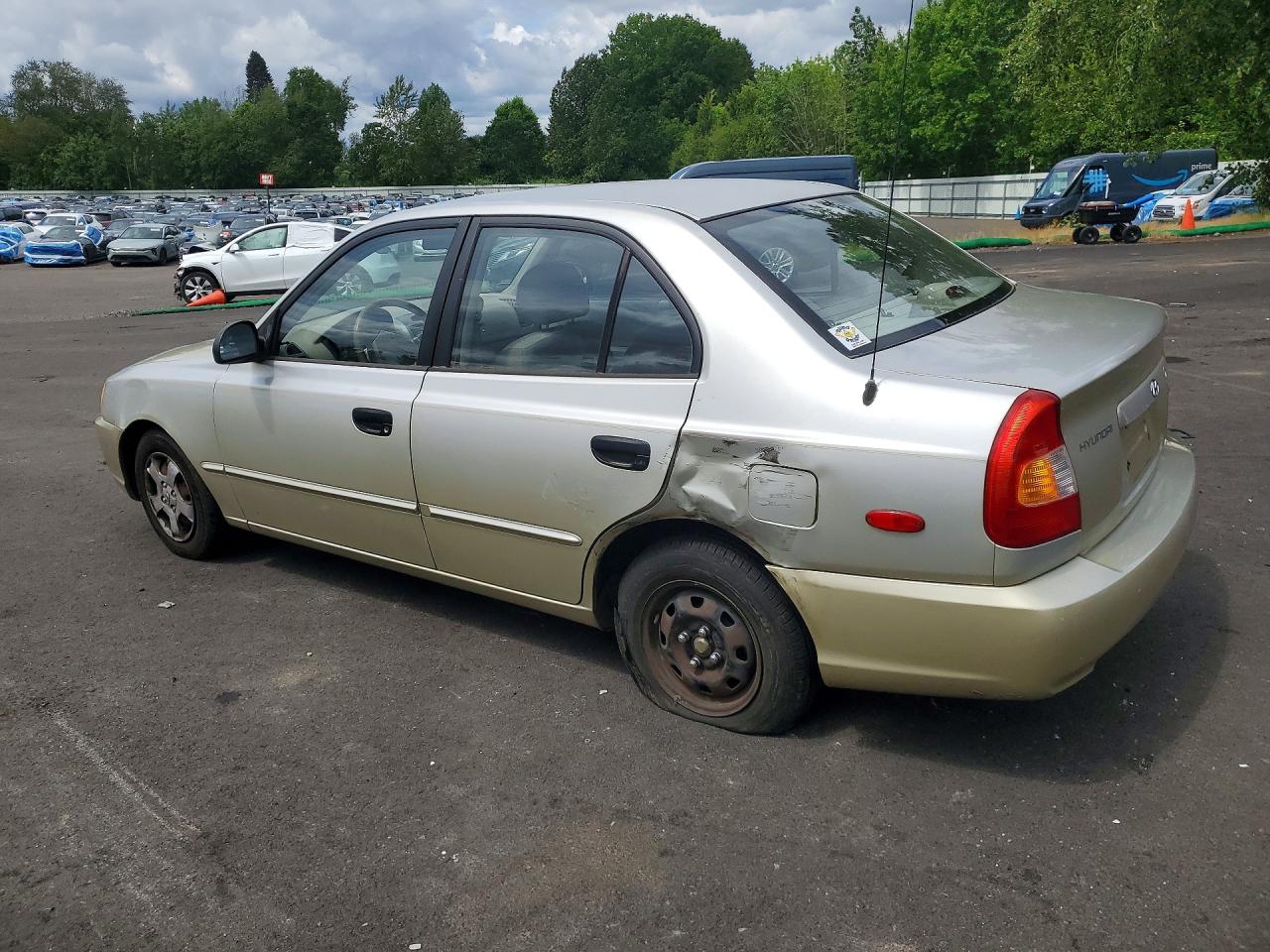 2002 Hyundai Accent Gl Tan vin: KMHCG45C42U389901