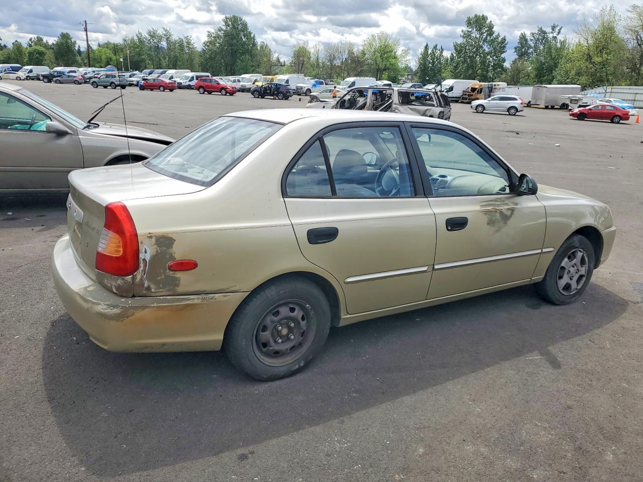 2002 Hyundai Accent Gl Tan vin: KMHCG45C42U389901
