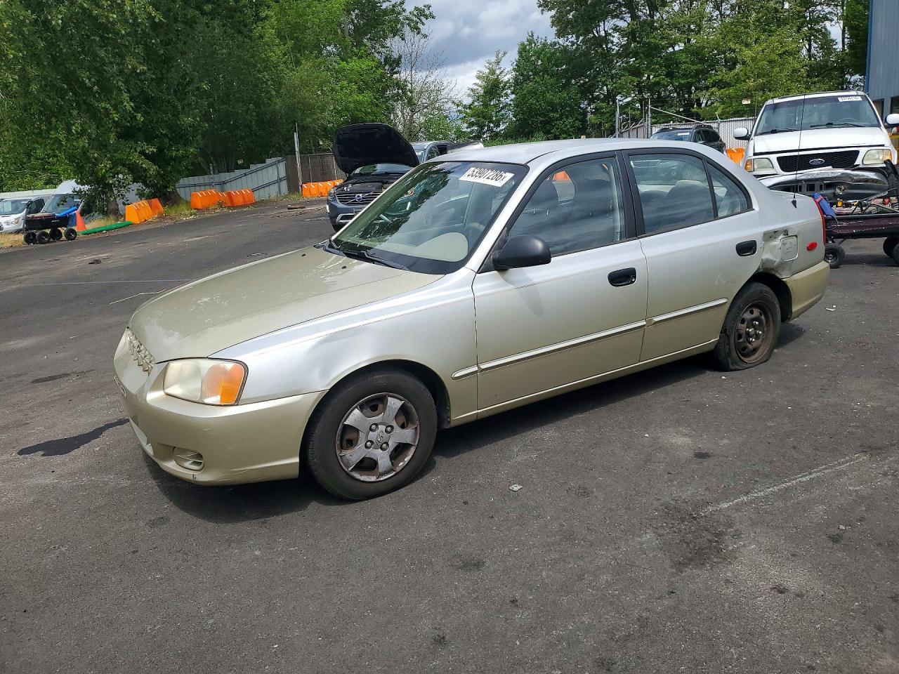 2002 Hyundai Accent Gl Tan vin: KMHCG45C42U389901