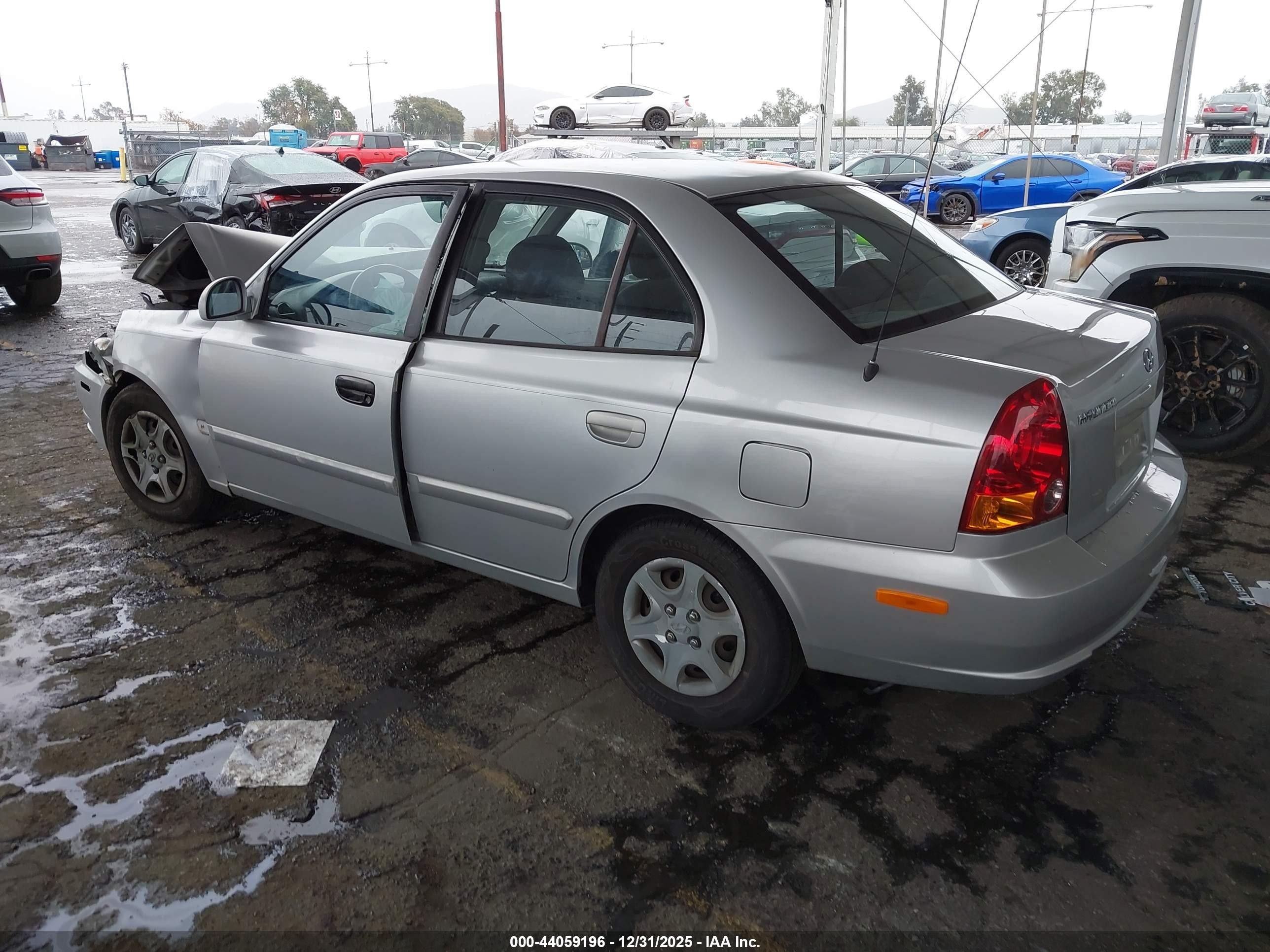 2004 Hyundai Accent Gl Серебряный vin: KMHCG45CX4U534507