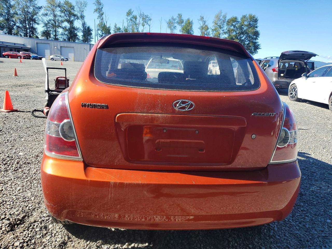 2008 Hyundai Accent Orange vin: KMHCM36C38U086604