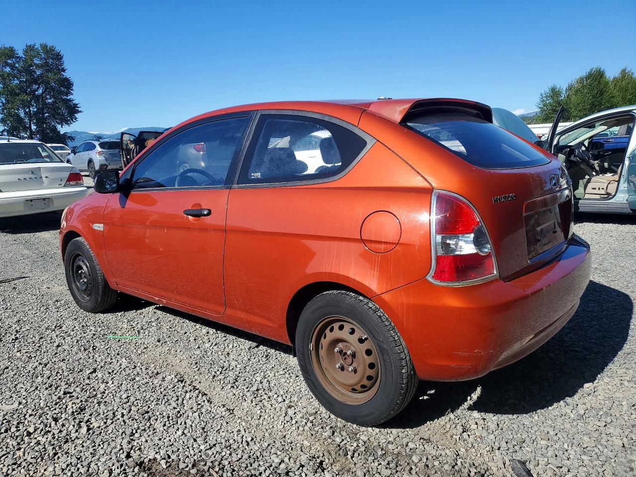 2008 Hyundai Accent Orange vin: KMHCM36C38U086604