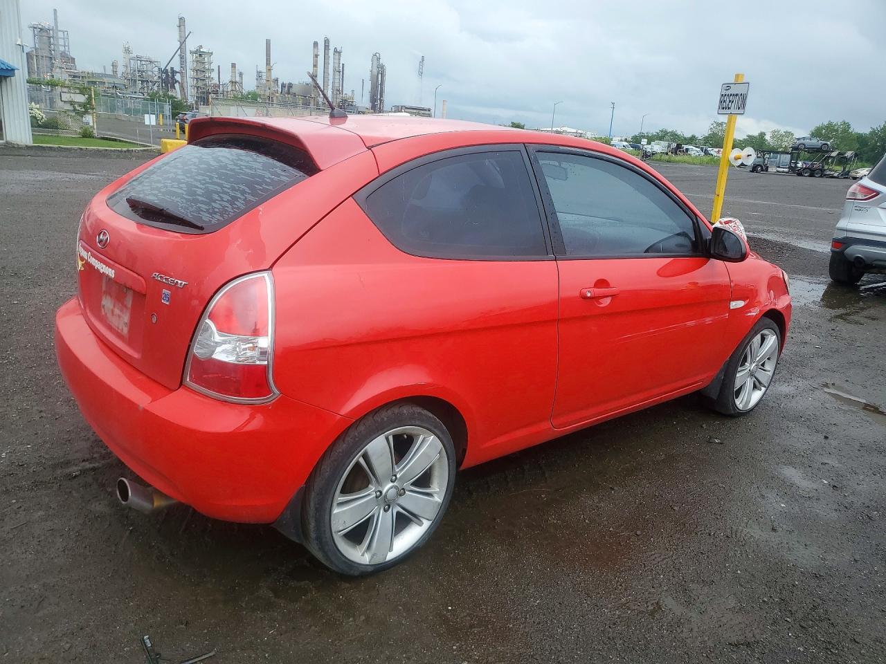 2008 Hyundai Accent Base Red vin: KMHCN35C08U091810