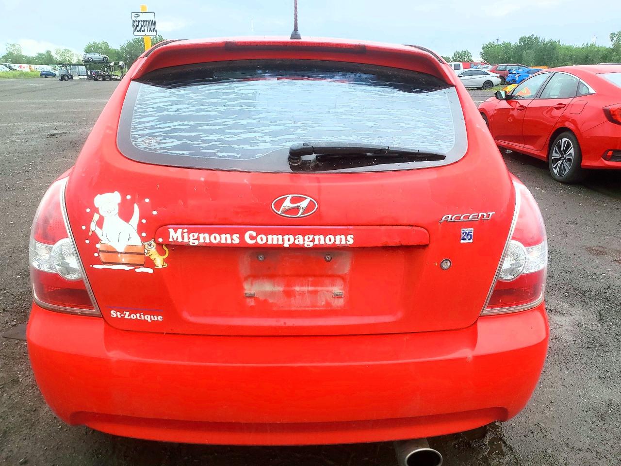 2008 Hyundai Accent Base Red vin: KMHCN35C08U091810