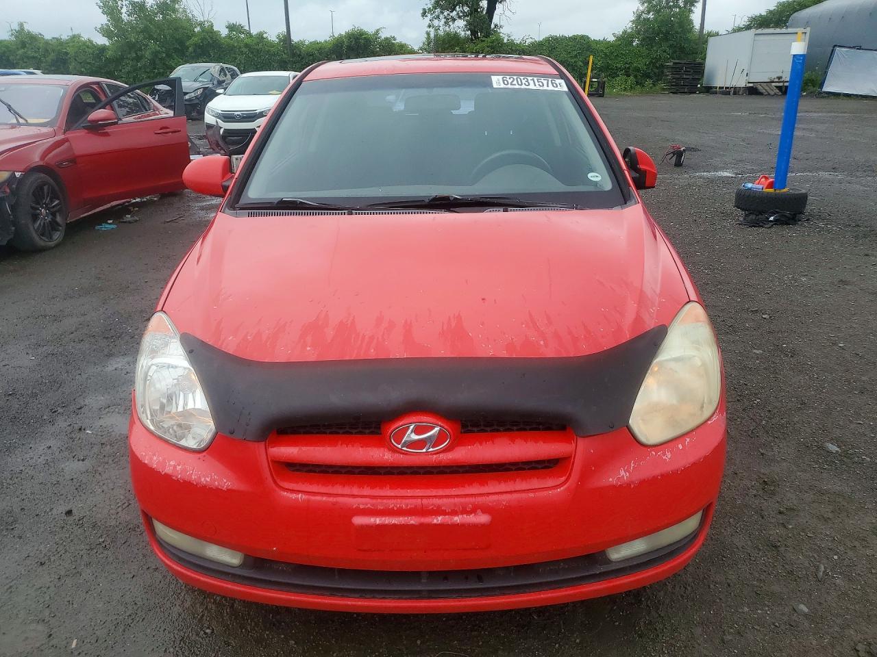 2008 Hyundai Accent Base Red vin: KMHCN35C08U091810