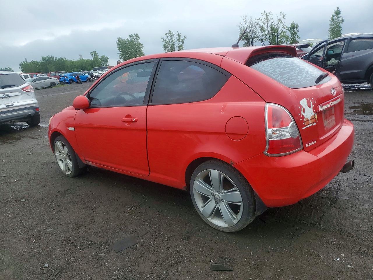 2008 Hyundai Accent Base Red vin: KMHCN35C08U091810