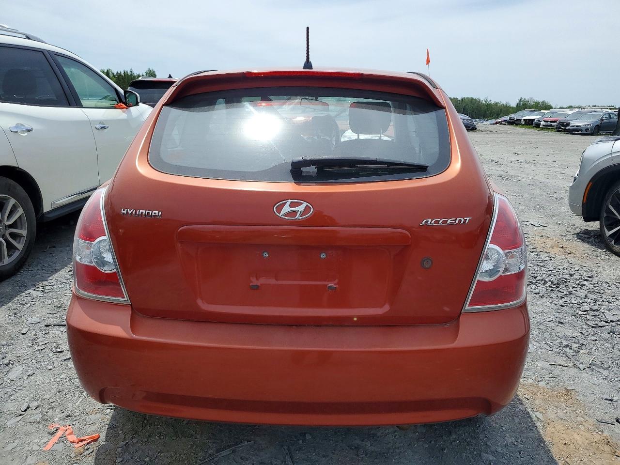 2009 Hyundai Accent Se Orange vin: KMHCN35CX9U132168