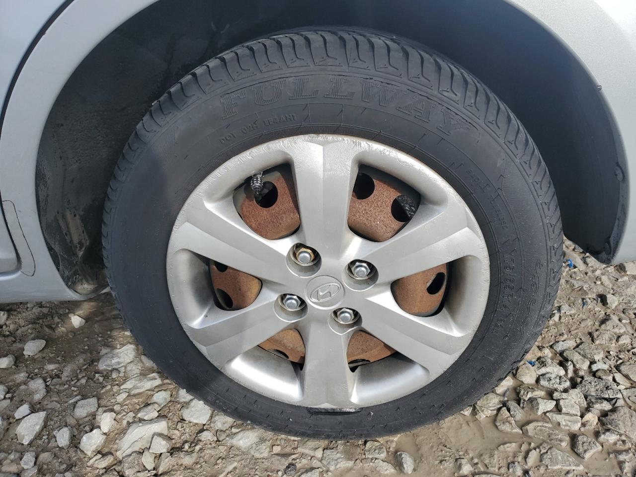 2011 Hyundai Accent Gls Silver vin: KMHCN4AC0BU606551 Damage: Left Rear Wheel Cover, Curb Rash, > 12 Inches