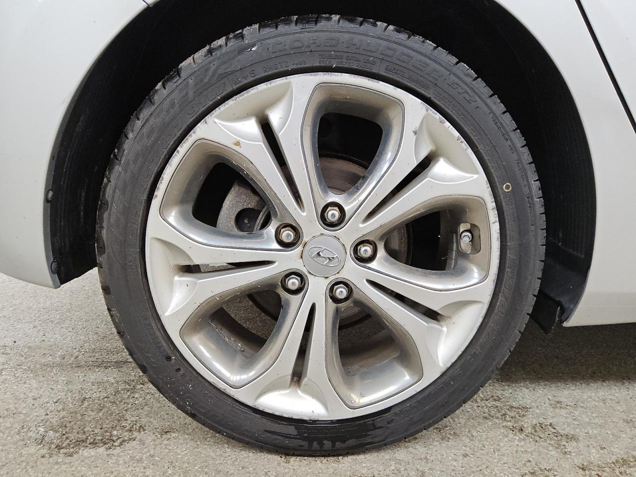 2013 Hyundai Elantra Gt Base Silver vin: KMHD35LE6DU124491 Damage: Right Rear Wheel, Curb Rash, > 12 Inches