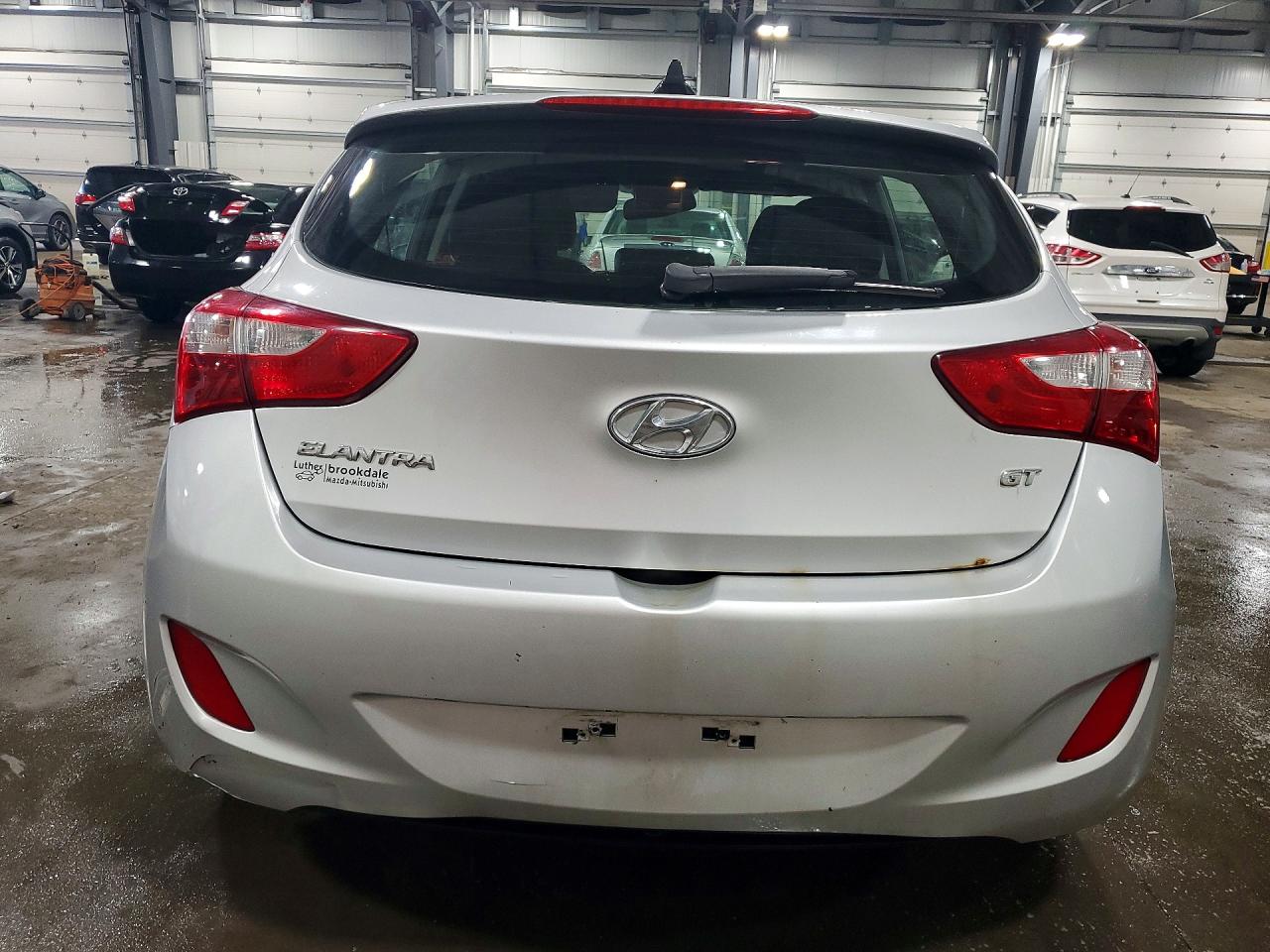 2013 Hyundai Elantra Gt Base Gold vin: KMHD35LE8DU059174