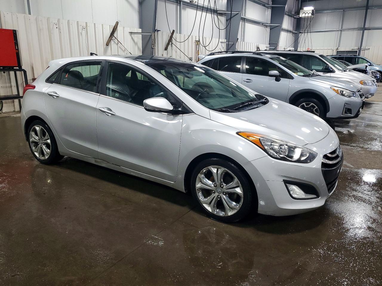 2013 Hyundai Elantra Gt Base Gold vin: KMHD35LE8DU059174