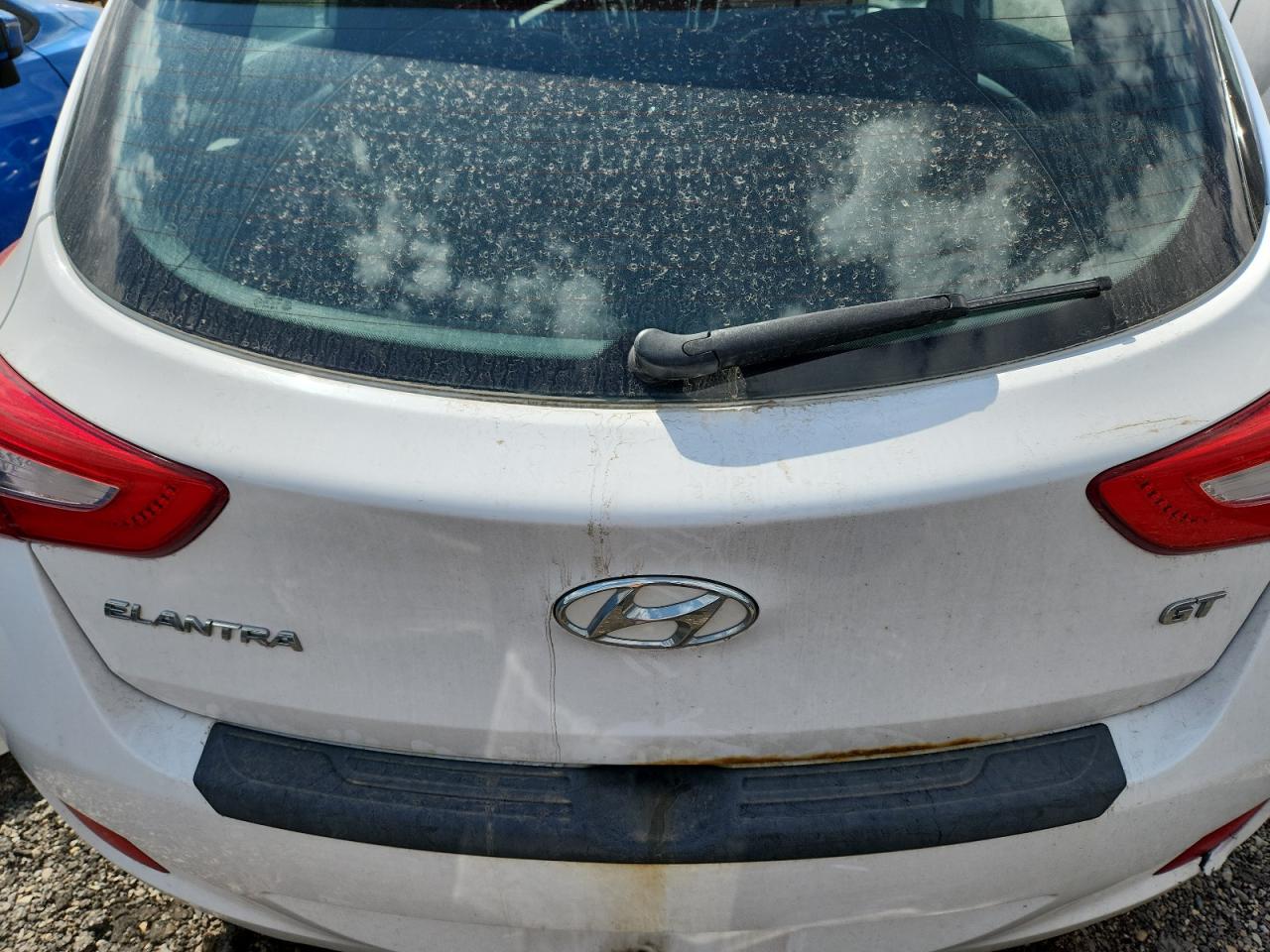2014 Hyundai Elantra Gt Base White vin: KMHD35LH6EU219810 Damage: Lift Gate, Rust, > 12 Inches