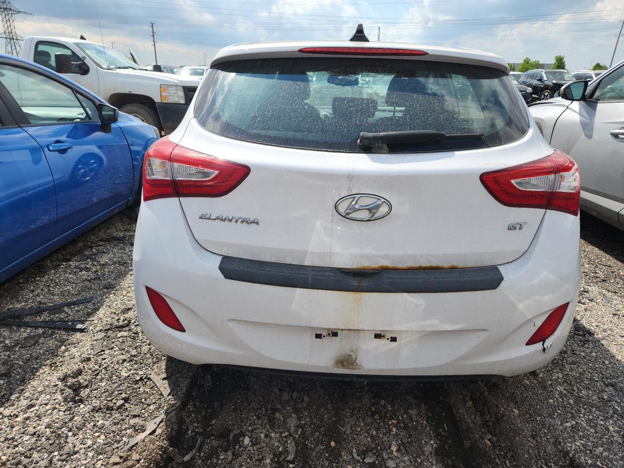 2014 Hyundai Elantra Gt Base White vin: KMHD35LH6EU219810 Damage: Rear Bumper, Cracked, 2 To 3 Inches